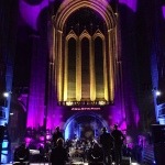 The Cheatles Beatles band on stage in the Well at The Liverpool Anglican Cathedral