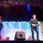 The Cheatles Beatles band on stage on the cruise ship Magellan