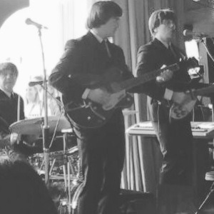 The Cheatles on stage at The Pan Am club Liverpool. Beatles cover bands.