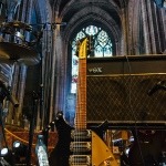 John Lennon Rickenbacker on a stand at Liverpool Cathedral. The Cheatles