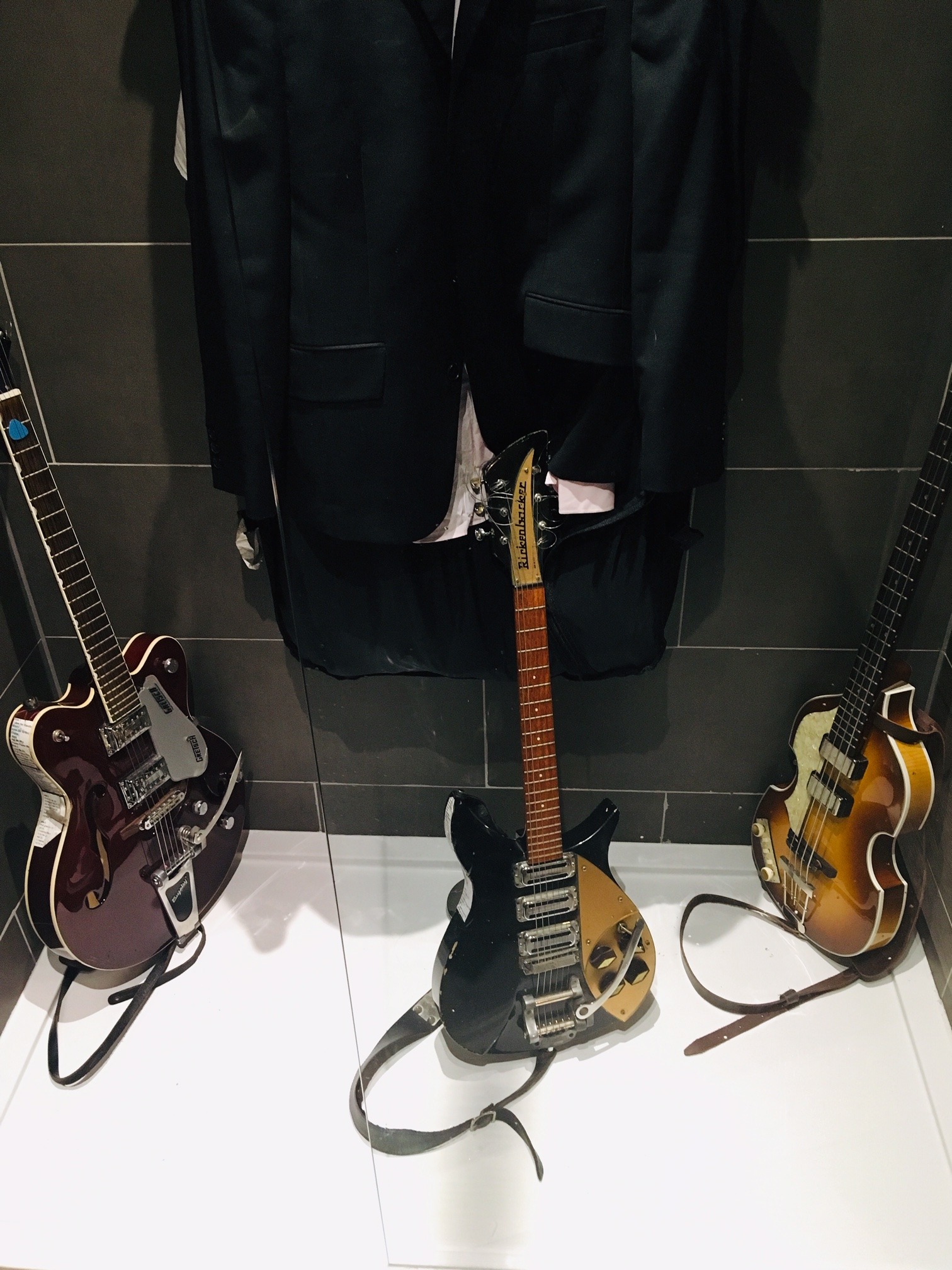A Rickenbacker and Gretsch guitar with a Hofner Bass guitars of the Beatles Bands